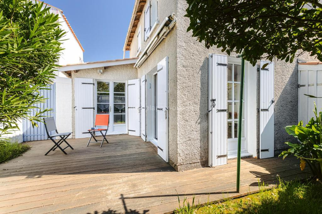 Photo de Maison a 4 min du marché et plages