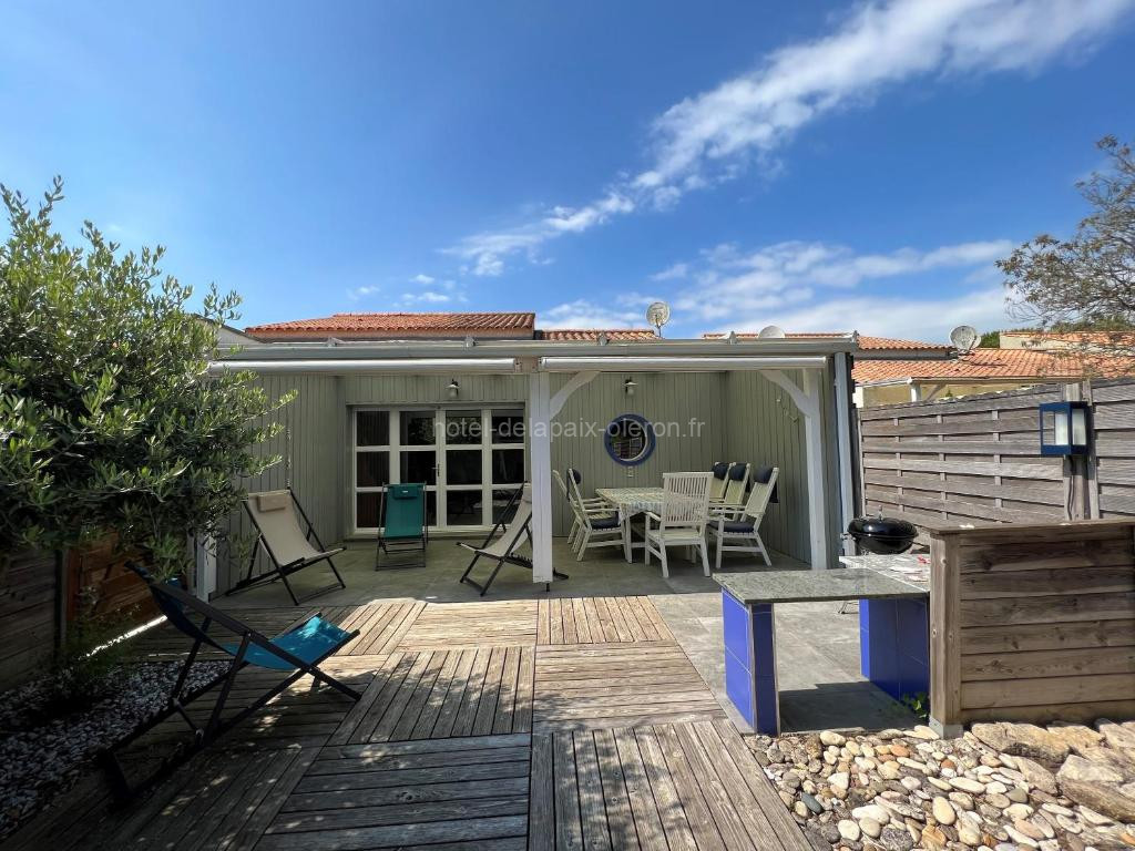 Photo de Maison cosy avec jardin